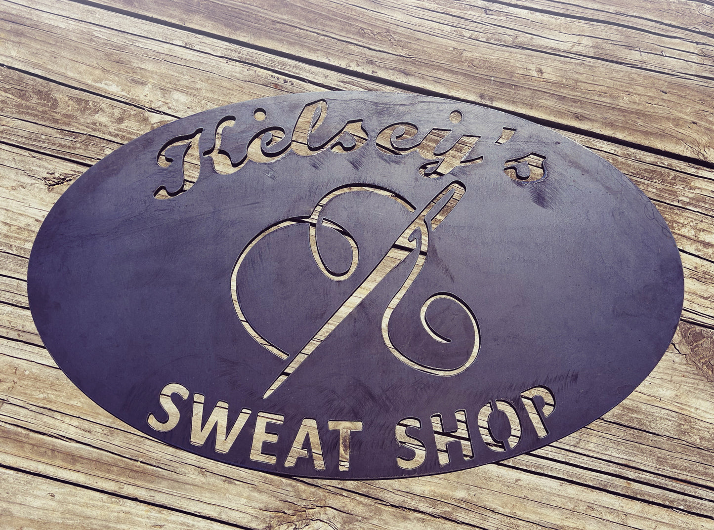 Sewing Needle Sweat Shop Sign